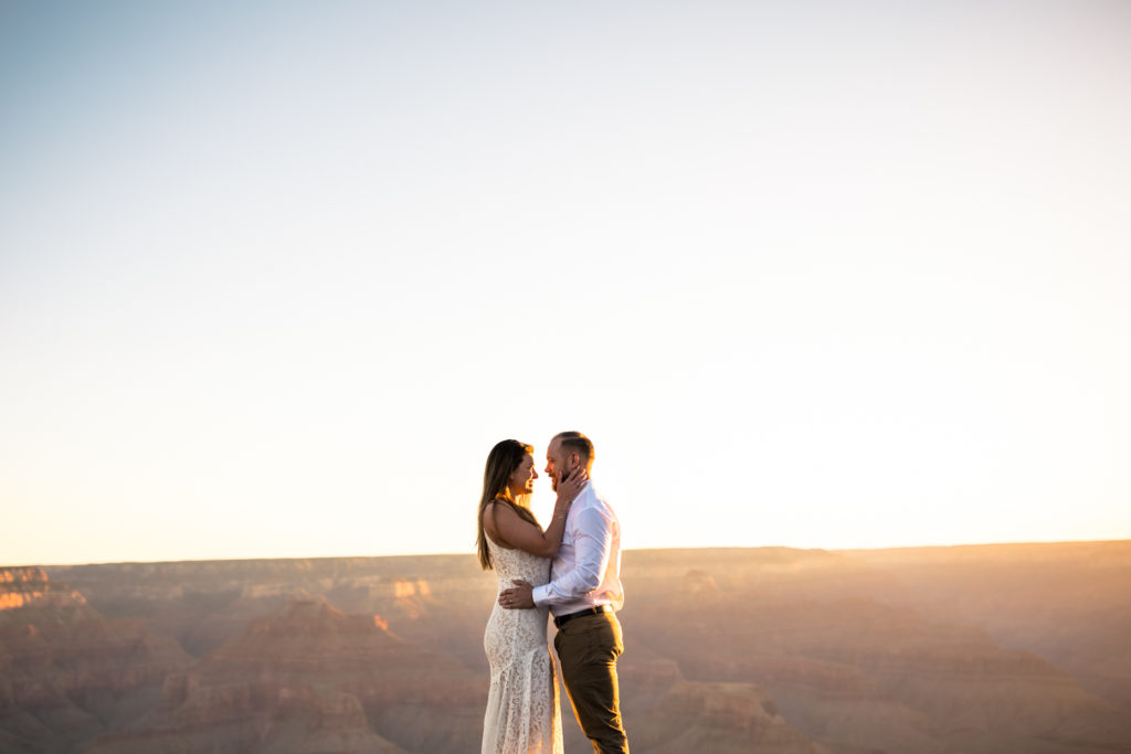 bride and groom embracing at hopi point