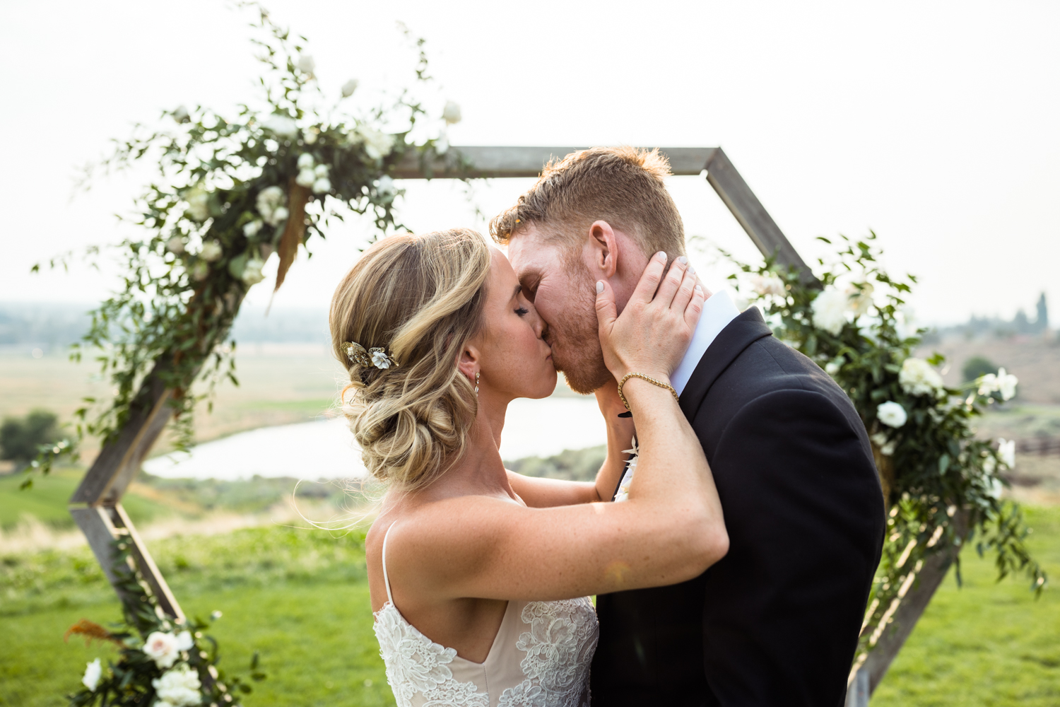bride and groom kissing at brasada ranch
