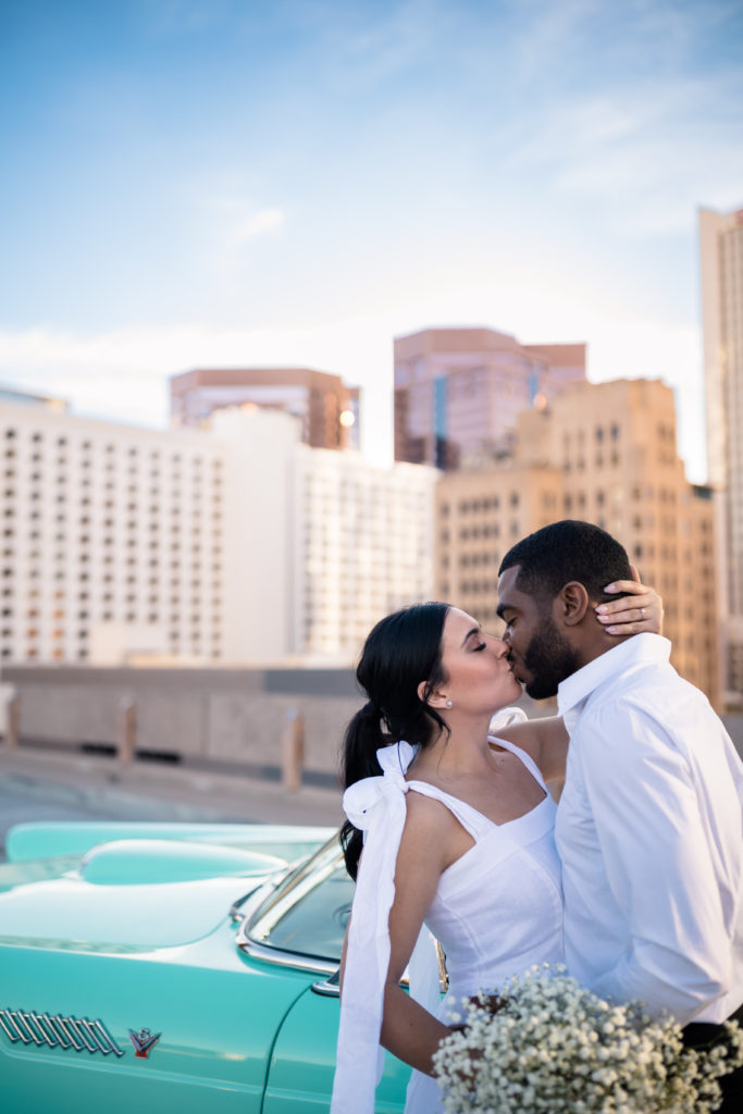 urban elopement with bride and groom kissing