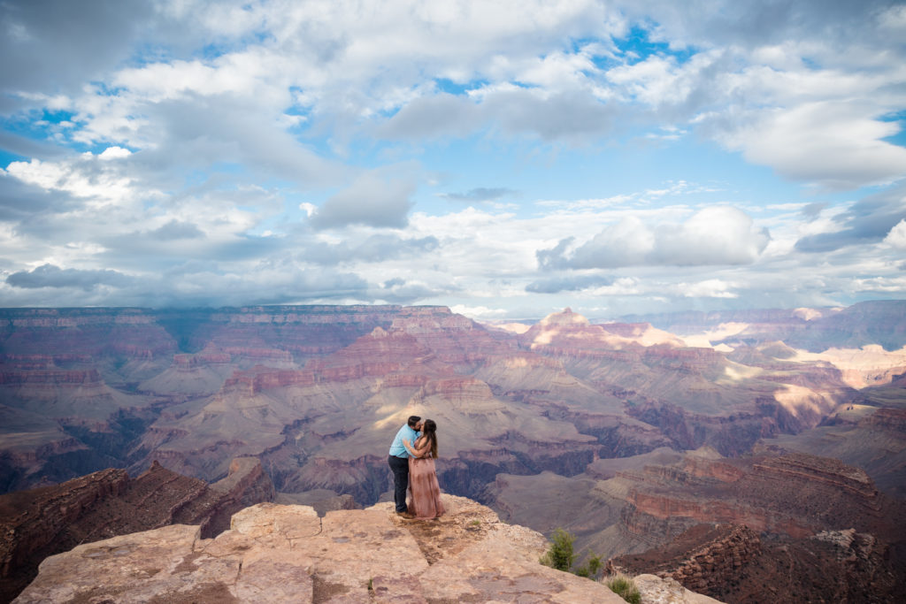 bride and groom kissing at the grand canyon