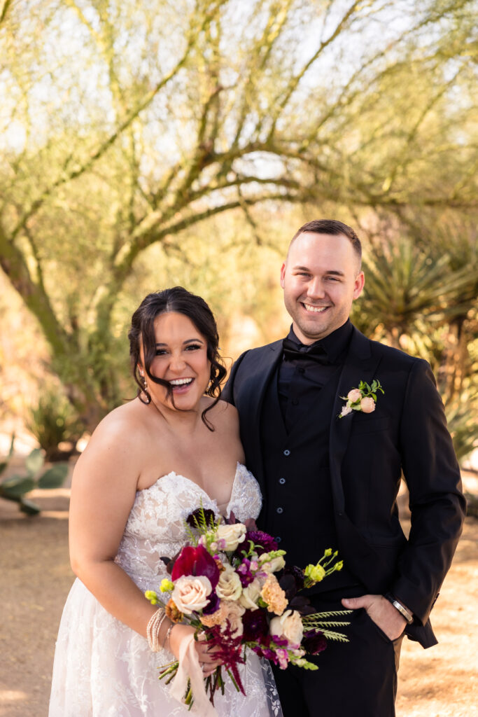 bride and groom laughing