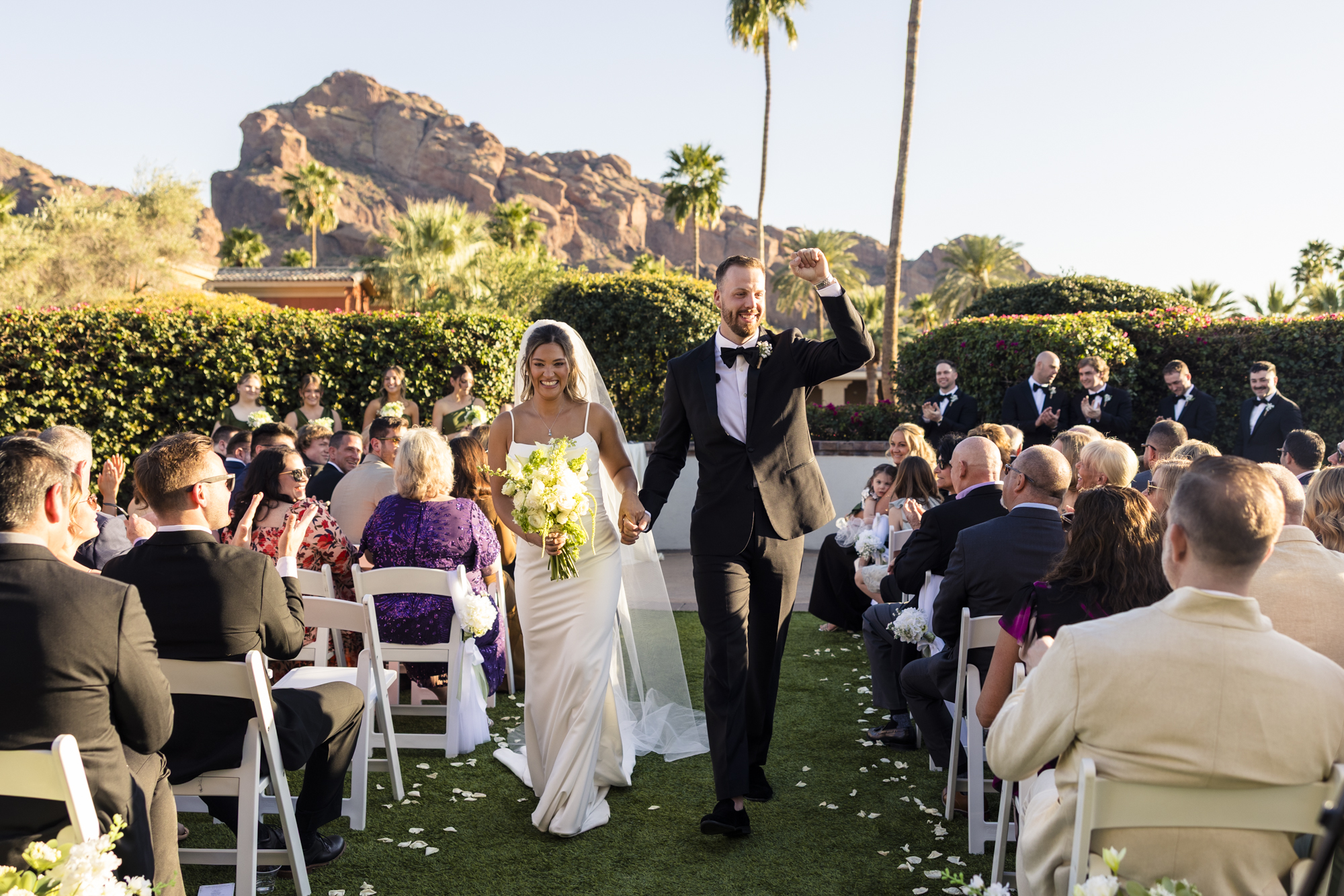 bride and groom walking down the aisle